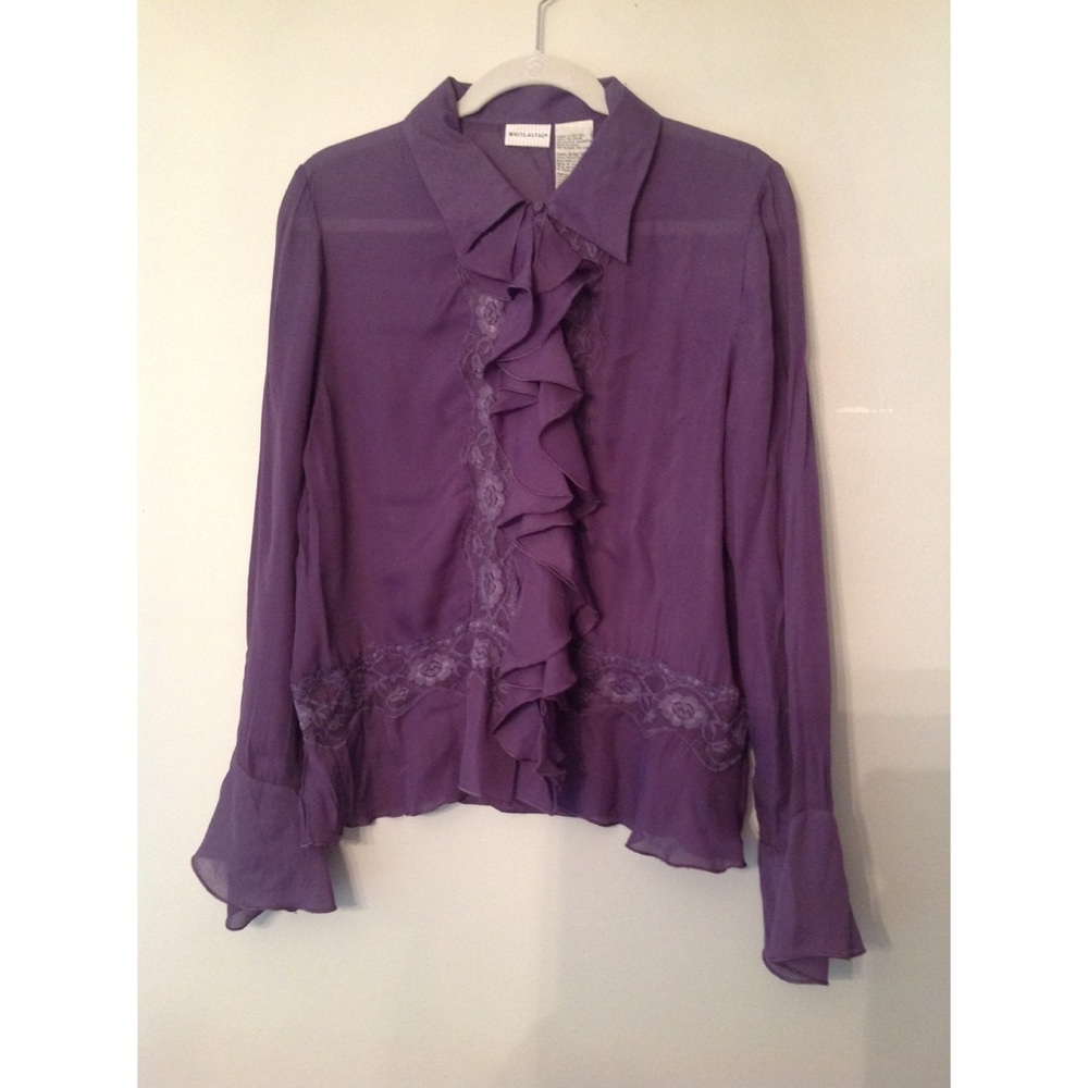 Purple sheer ruffled blouse, very Prince like.